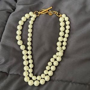 Two piece pearl necklace all together